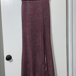 A long purple dress with slit